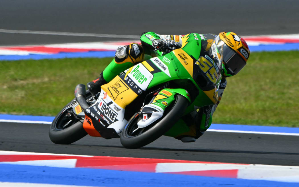 CIP Green Power team's Swiss Moto3 rider Noah Dettwiler corners during qualifying for the San Marino Moto GP in Misano Adriatico, northern Italy, on September 13, 2025. (Photo by Andreas SOLARO / AFP)