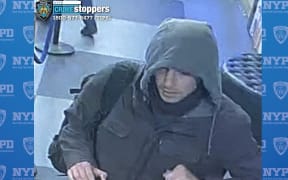 NYPD release photos of suspected gunman without mask