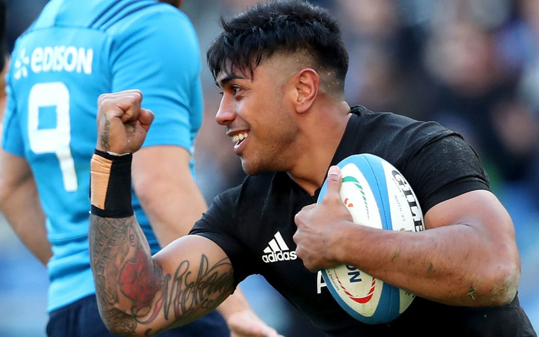Malakai Fekitoa celebrates scoring a try against Italy.