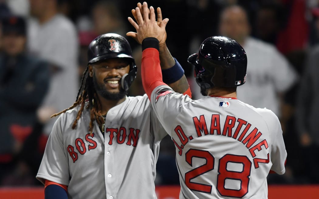 Red Sox players celebrate.