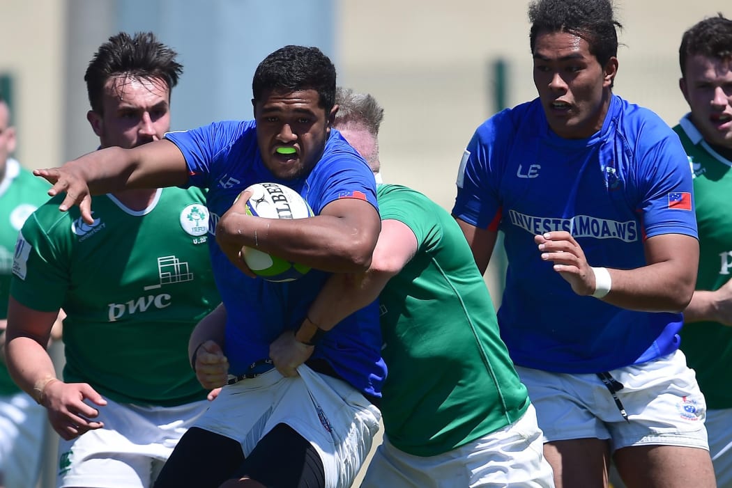 Samoa number eight Sione Tuipolotu is tackled in their ninth place semi-final with Ireland.