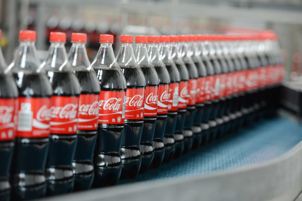 Bottles of Coca-Cola on a production line.