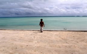 Kiribati - figure at shoreline
