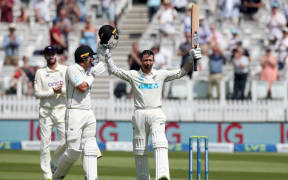 Devon Conway celebrates reaching 200 by raising his bat, Lord's 2021.