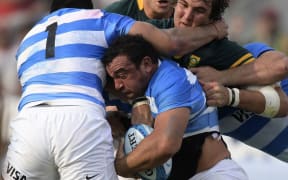Argentina No.8 Facundo Isa in action in their Rugby Championship match at Padre Ernesto Martearena stadium in Salta, August 27, 2016. 
JUAN MABROMATA / AFP