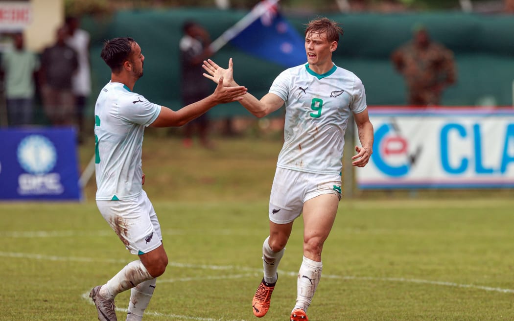New Zealand's Ben Wine celebrates scoring a goal.