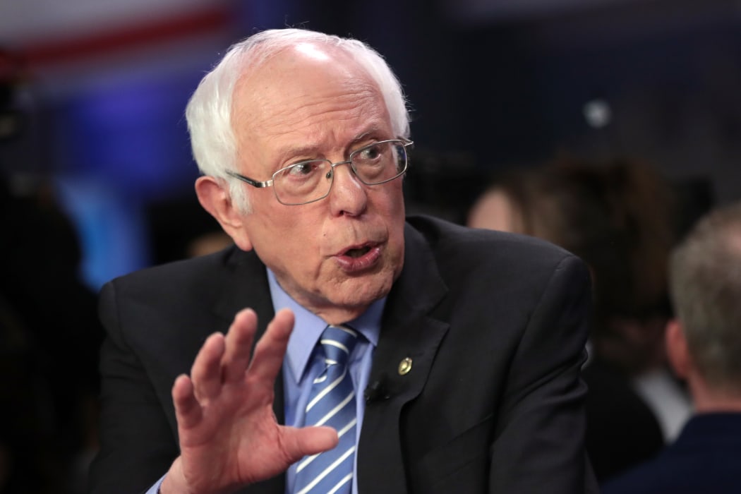 Democratic presidential candidate Bernie Sanders speaks to media in the spin room after the Democratic presidential primary debate at the Charleston on February 25, 2020.