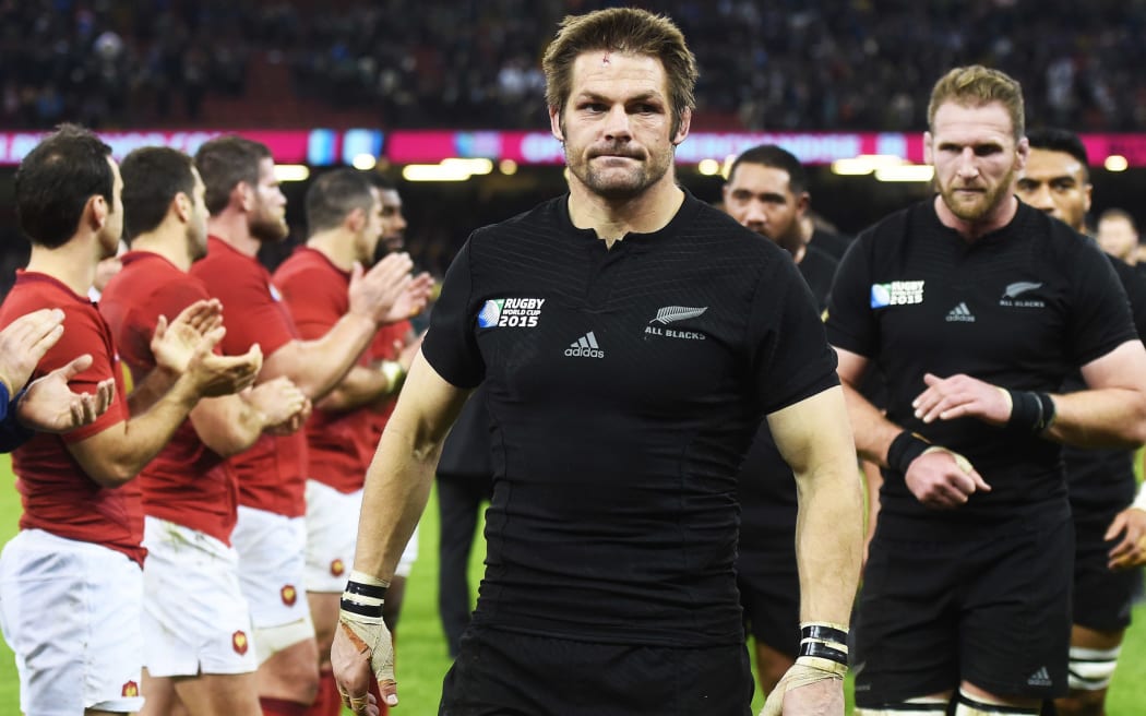 All Blacks skipper Richie McCaw leads his side from the field after their quarterfinal win over France.