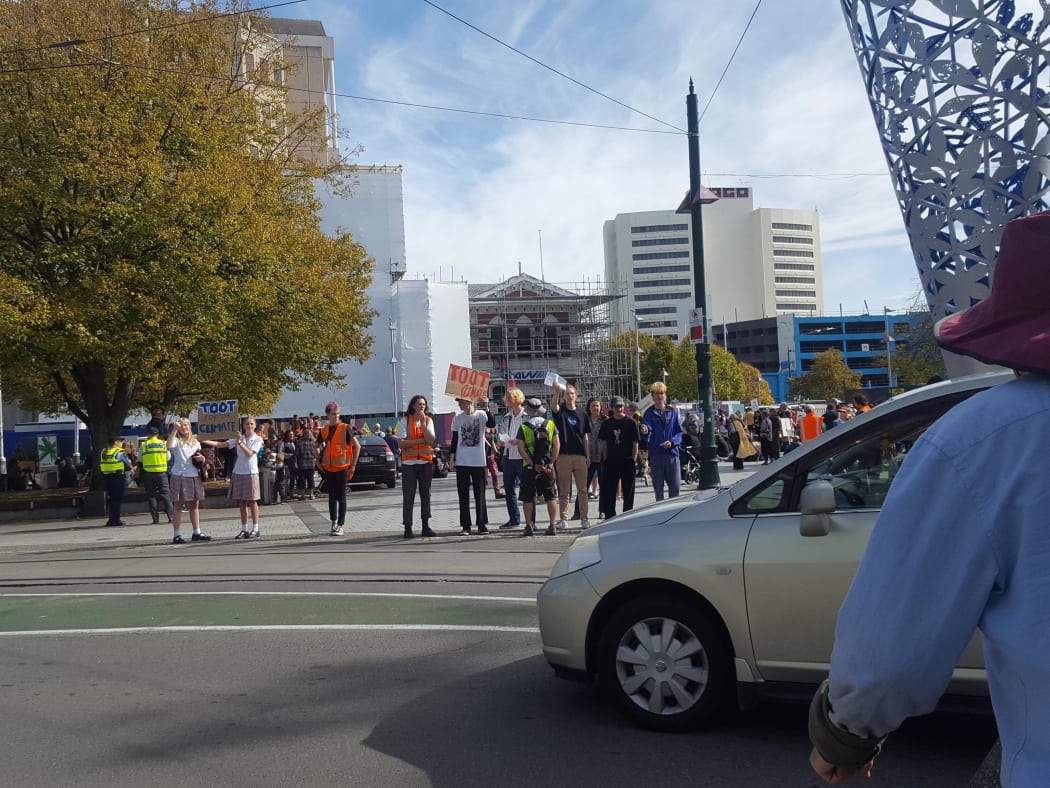 Christchurch protesters seeking support from passing motorists.