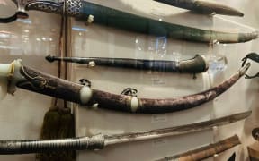 Tūhura Otago Museum has refuted claims a sword (middle) in its collection had any connection to 10th Sikh Guru Gobind Singh.