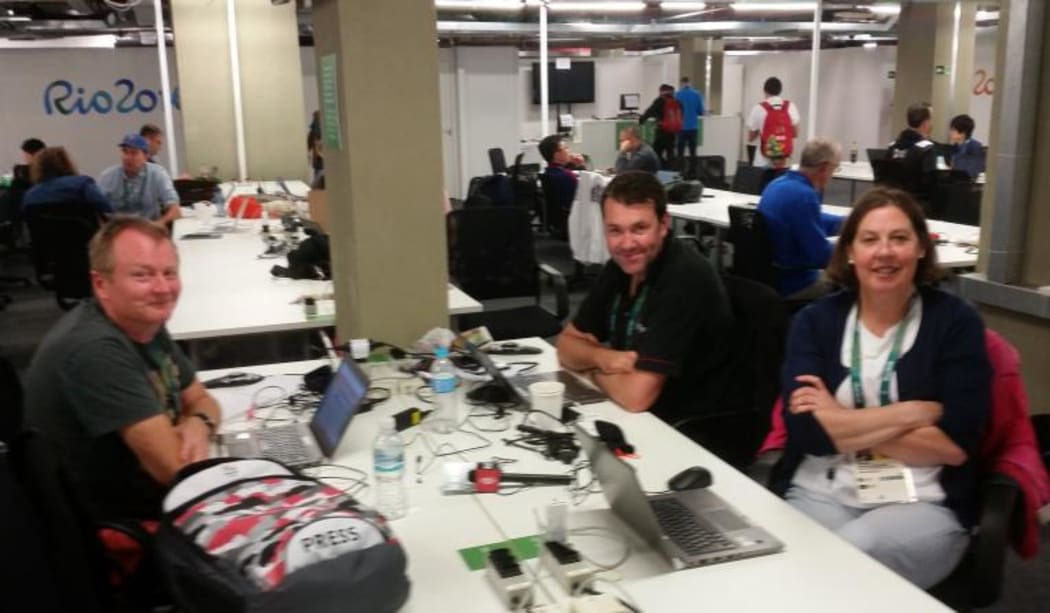 Barry Guy, Stephen Hewson and Gael Woods in the main press centre.