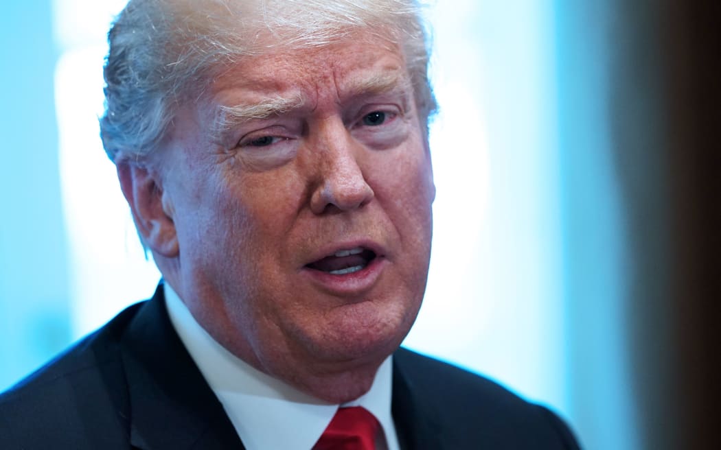 US President Donald Trump speaks on steel and aluminum tariffs during a meeting with industry leaders in the Cabinet Room of the White House.