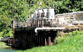 The weir (dam) at Londolovit river where Lihir Gold (Newcrest Mining Limited) extracts water for its local mine operations.