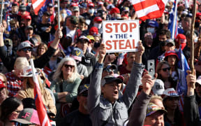 People participate in the Million MAGA March from Freedom Plaza to the Supreme Court, on November 14, 2020 in Washington, DC.