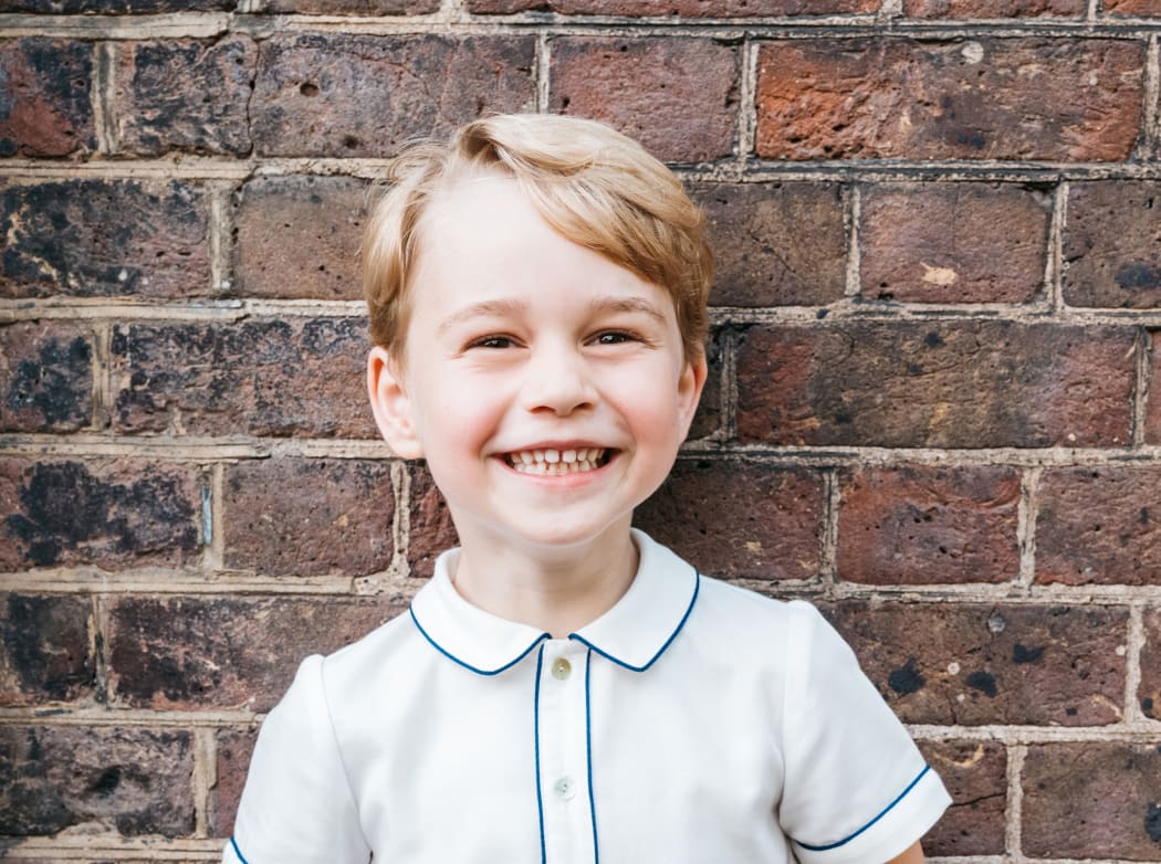 A handout picture released by Kensington Palace to mark Prince George's fifth birthday shows him smiling to camera.