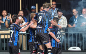 Auckland FC's Jesse Randall scores and celebrates his goal. A-League Men, Round 2, Auckland FC v Western Sydney Wanderers.