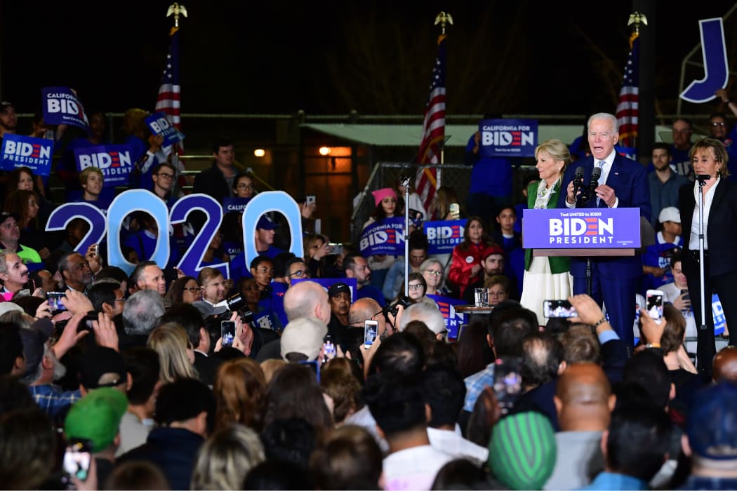 Democratic presidential hopeful former Vice President Joe Biden, flanked by his wife Jill (L) and sister Valerie, addresses a Super Tuesday event in Los Angeles on March 3, 2020.