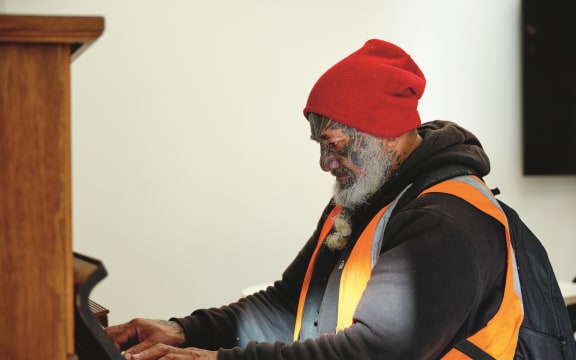 Cookie - a Mission, and now HomeGround regular, plays the piano in Haeata, the HomeGround dining room