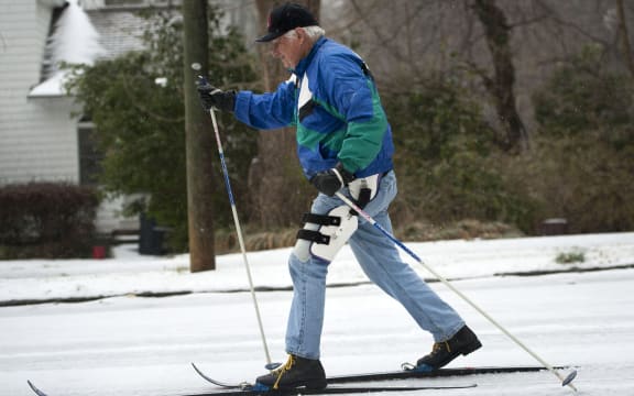 Furman Smith breaks out his cross-country skis in Atlanta, Georgia, on Wednesday.