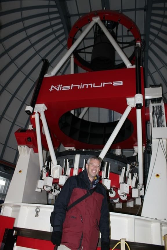 Nick Rattenbury with the MOA telescope at Mt John, Lake Tekapo.