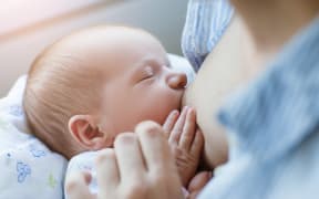 breastfeeding for newborns motherhood concept. helpful tips for feeding the baby. love and tenderness.