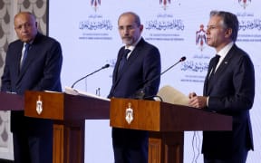 US Secretary of State Antony Blinken (R), Egyptian Foreign Minister Sameh Shoukry (L) and Jordanian Deputy Prime Minister and Foreign Minister Ayman Safadi hold a press conference, after meetings amid the ongoing conflict between Israel and the Palestinian group Hamas, in Amman on November 4, 2023. (Photo by Jonathan ERNST / POOL / AFP)