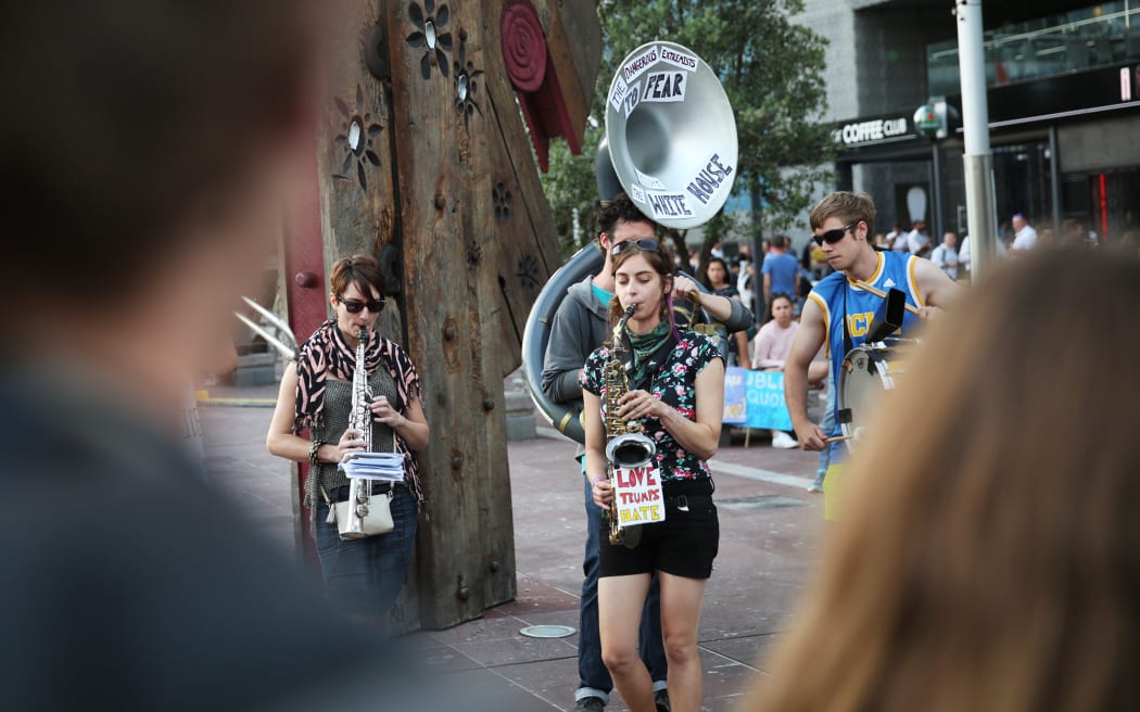 Strangers in a Strange Band saxophonist Kate Riegle says music is a great way to peacefully protest.