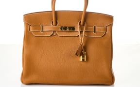 Hermes Rouge Casaque Togo Leather Birkin 30, with an estimate of up to $29,000.