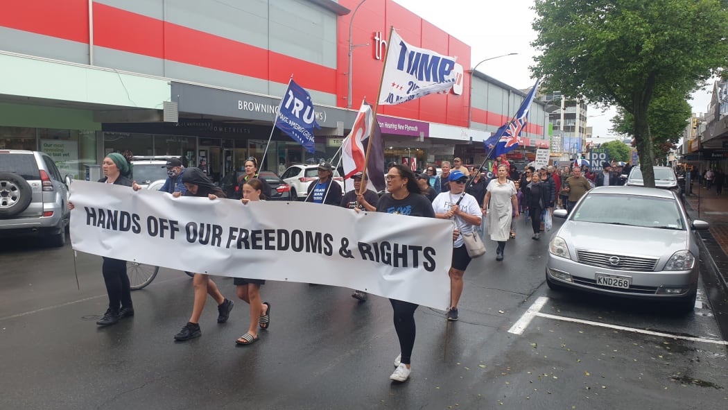 About 200 protesters marched up Devon Street on 4 December, calling on the government to end the vaccine mandate.
