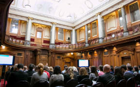 A policy to legislation seminar held in the Legislative Counsel Chamber at Parliament.