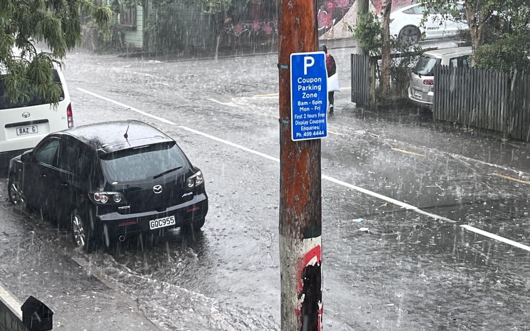 Aro Street in Wellington has surface flooding as a sever thunderstom warning is issued for the city on 12 December 2023.