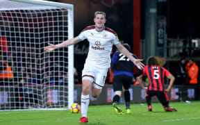 Chris Wood scores for Burnley.