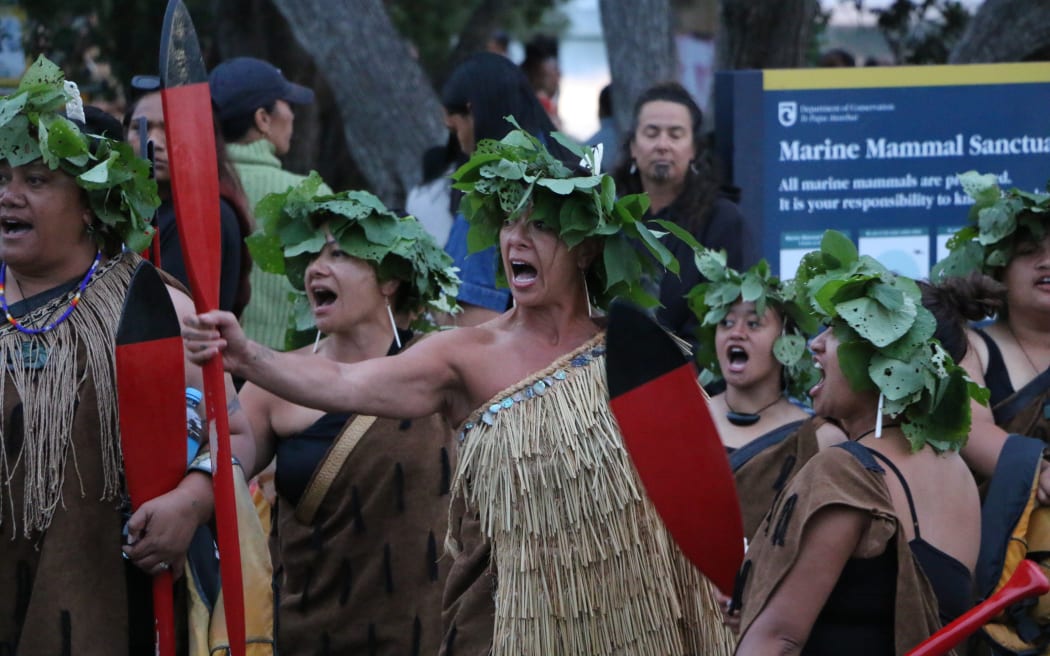 Tanya Rogers, the kaihautū (captain) of Tī Eke Waka o Te Arawa, one of the few waka exclusively paddled by wāhine, leads a haka before waka celebrations at waitangi.
