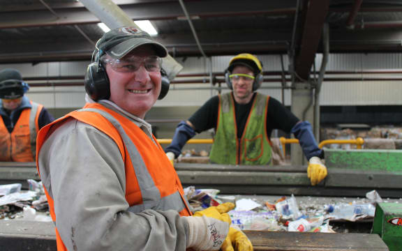 A photo of Alistair Hatton and Paul Burtenshaw on the recycling sortline