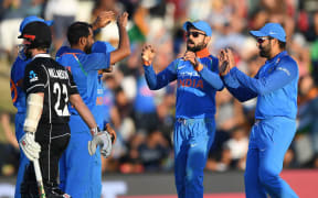 India celebrate the dismissal of Black Caps captain Kane Williamson.