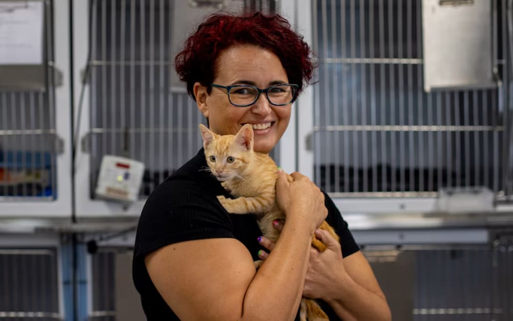 Pam Siddins with JJ the kitten.