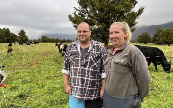Kelley Molloy with her partner Richard Eatwell on their Waiho Flat dairy run-off property which has now dropped in value due to a signal the area will be abandoned.
