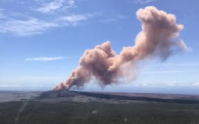 In this photo provided bt the US Geological Survey, an ash plume rises above the Kilauea volcano on Hawaii's Big Island on May 3, 2018.