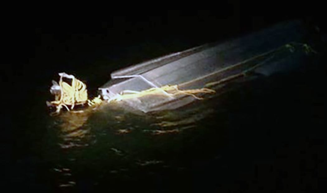 A supplied picture of the capsized boat in the Firth of Thames.