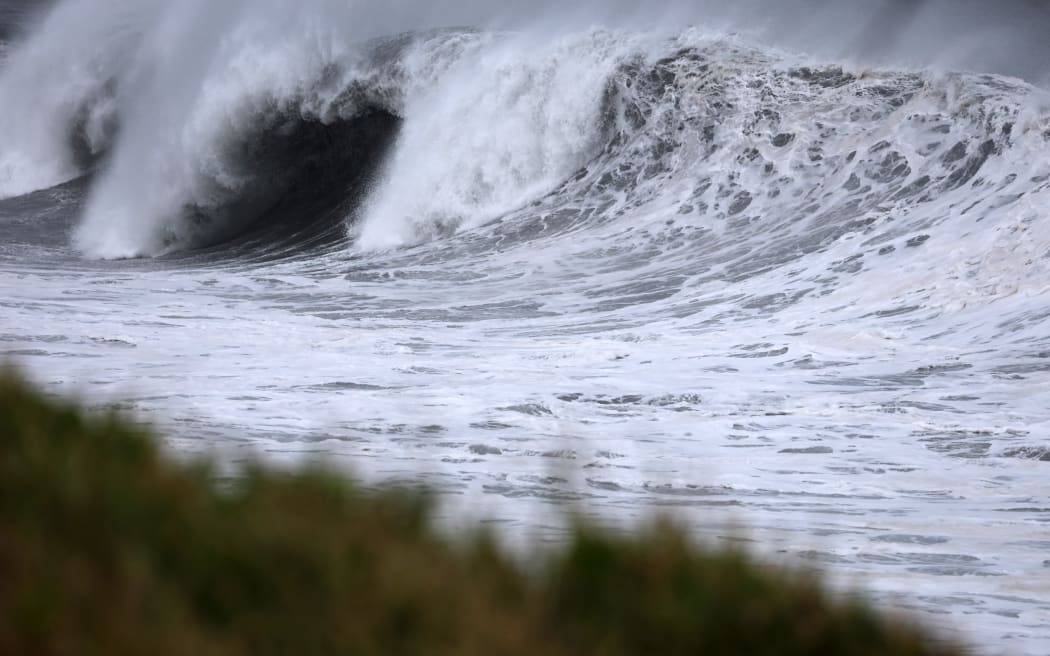 High waves crash along the shore as Cyclone Freddy nears the French overseas island of La Reunion on 20 February, 2023.