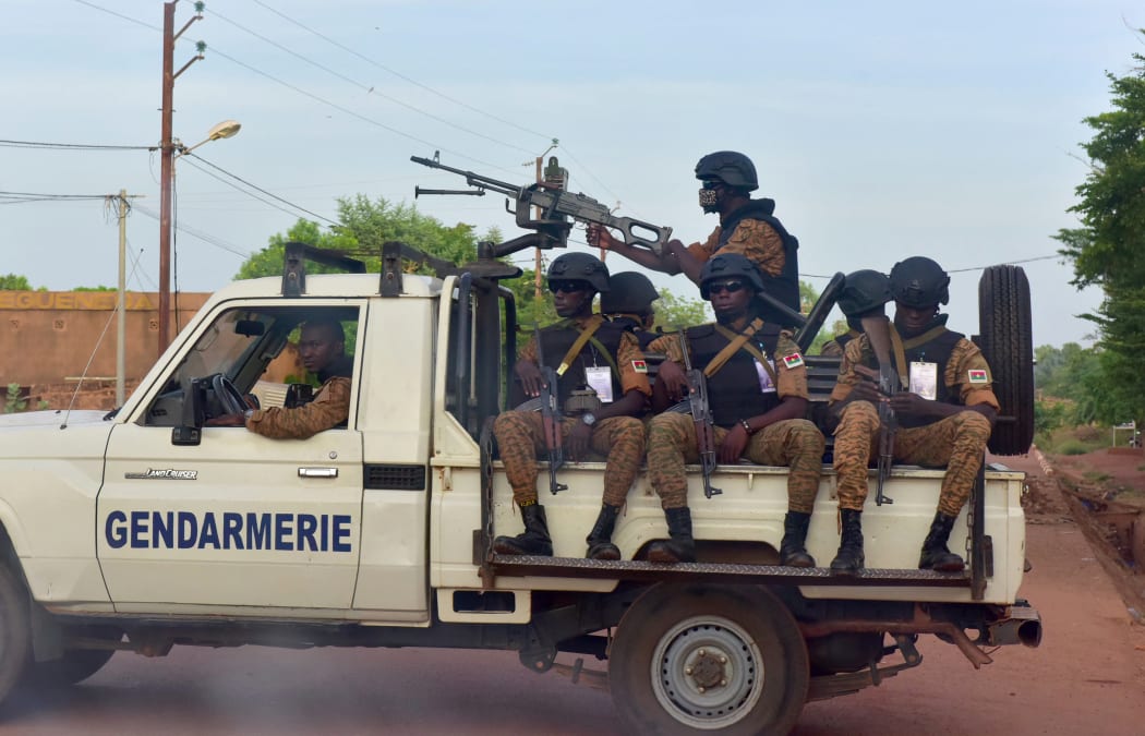 A picture take on 30 October 2018 shows Burkinabe gendarmes sitting on their vehicle in the city of Ouhigouya in the north of the country.