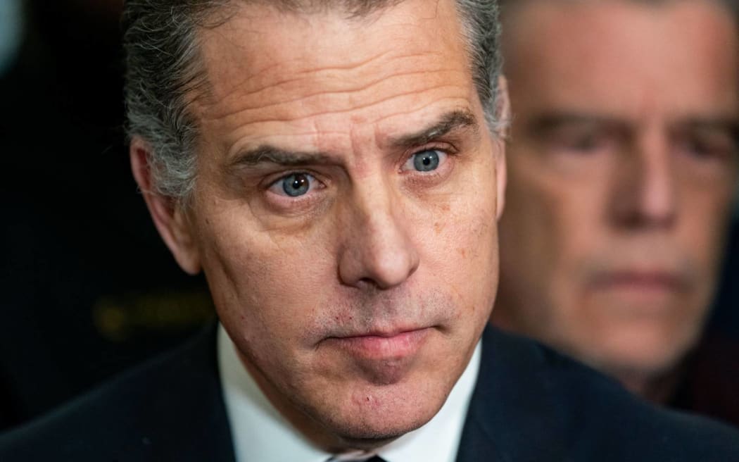 WASHINGTON, DC - JANUARY 10:Hunter Biden, son of U.S. President Joe Biden listens as his lawyer Abbe Lowell speaks to the press outside a House Oversight Committee meeting on January 10, 2024 in Washington, DC. The committee is meeting today as it considers citing him for Contempt of Congress.   Kent Nishimura/Getty Images/AFP (Photo by Kent Nishimura / GETTY IMAGES NORTH AMERICA / Getty Images via AFP)