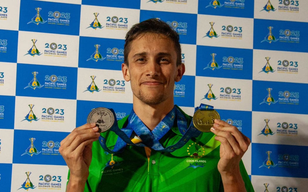 Cook Islands swimming record breaker Wesley  Roberts with his medal haul. Photo: Team Cook Islands