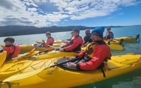 Image of Big Buddy boys out kayaking on Manukau Harbour.