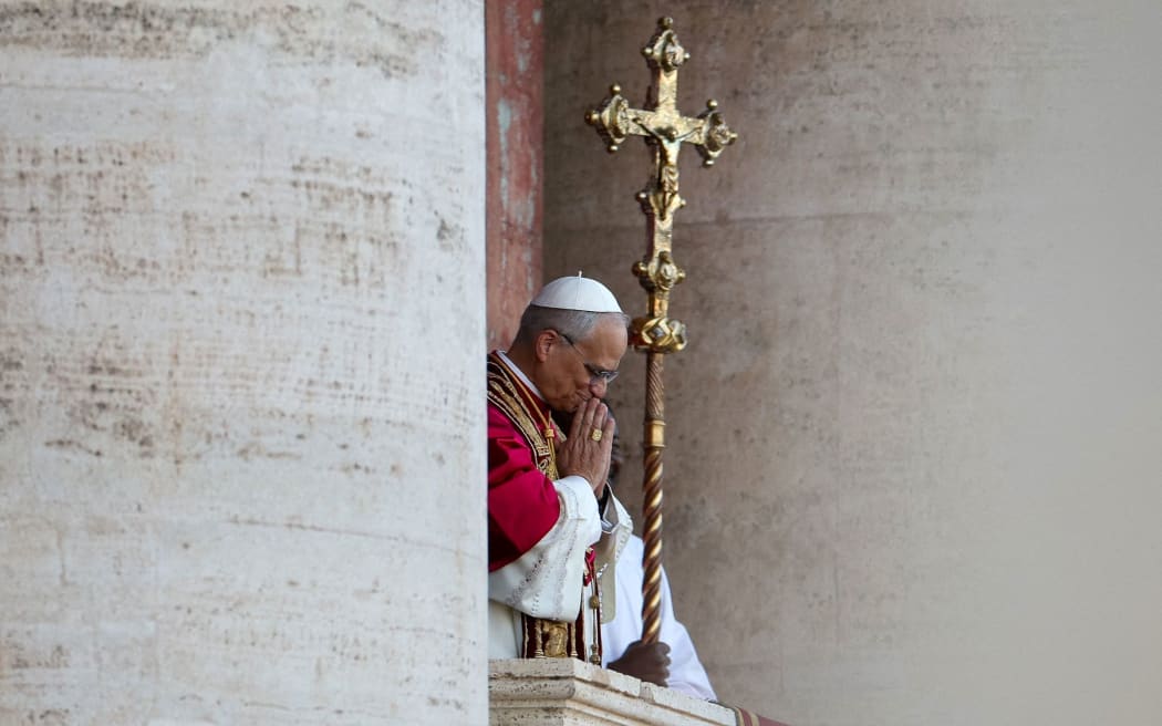 Newly elected Pope Leo XIV, Cardinal Robert Prevost of the United States, appears on the balcony of St. Peter's Basilica at the Vatican on May 8.