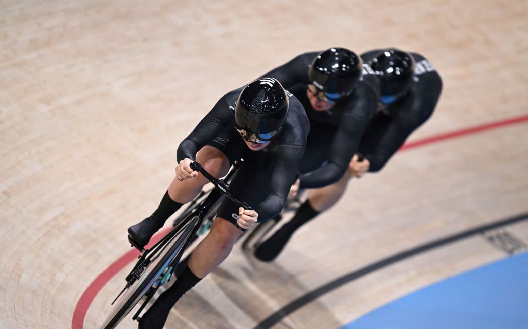 Team New Zealand, New Zealand's Ellesse Andrews, New Zealand's Shaane Fulton and New Zealand's Rebecca Petch compete in the women's track cycling team sprint first round of the Paris 2024 Olympic Games at the Saint-Quentin-en-Yvelines National Velodrome in Montigny-le-Bretonneux, south-west of Paris, on August 5, 2024. (Photo by SEBASTIEN BOZON / AFP)