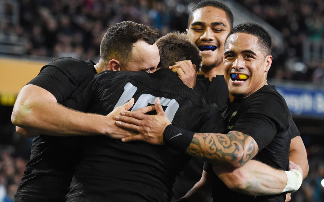 The All Blacks celebrate Beauden Barrett's 2nd try.
