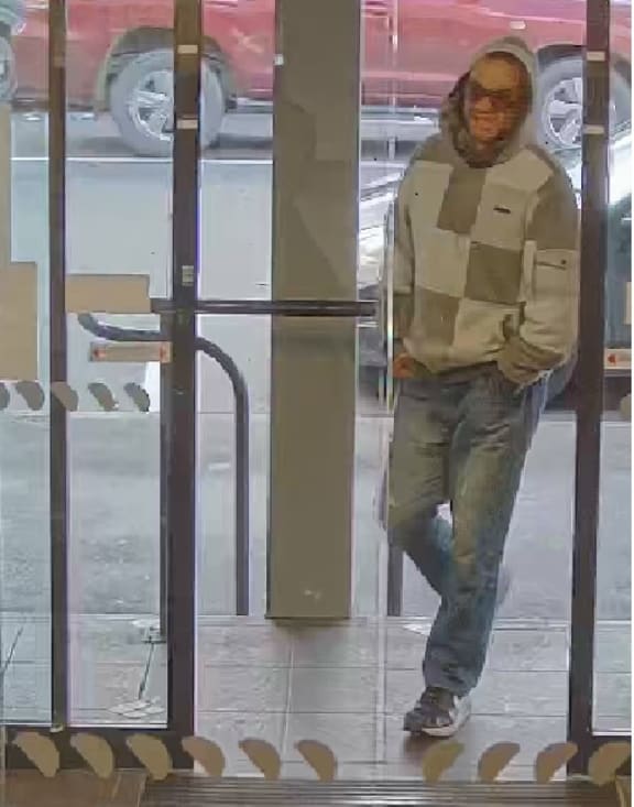 Police are seeking the person shown in this photo after a bank robbery in Rangiora.