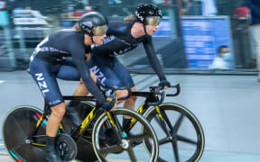 Aaron Gate and Campbell Stewart competing in the madison at the 2022 World Track Championships.