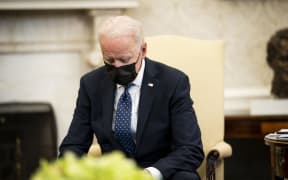 President Joe Biden pauses during a meeting with the leadership of the Congressional Hispanic Caucus in the Oval Office of the White House.